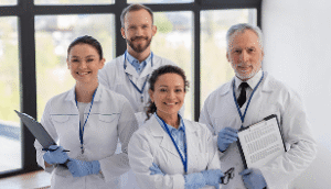 medium-shot-scientists-posing-together 1