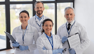 medium-shot-scientists-posing-together 1